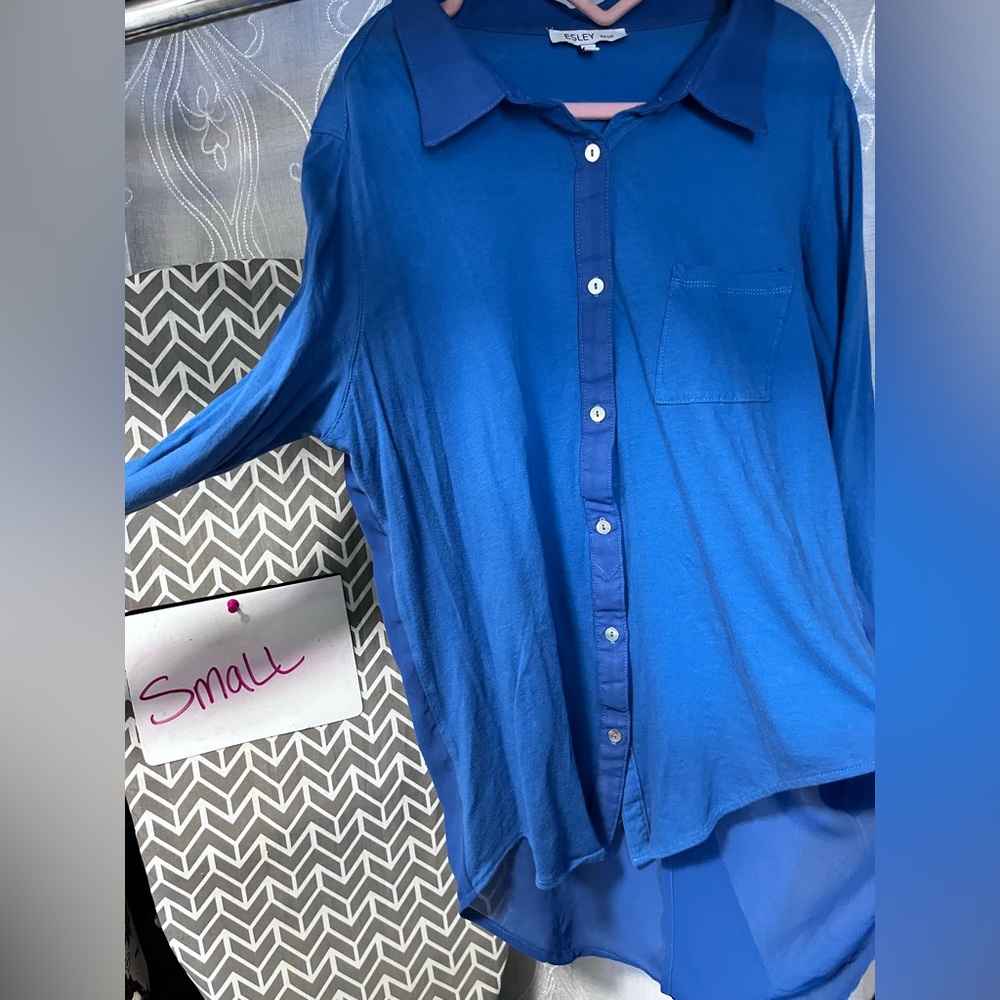 Blue button down. Sheer back with unique design
